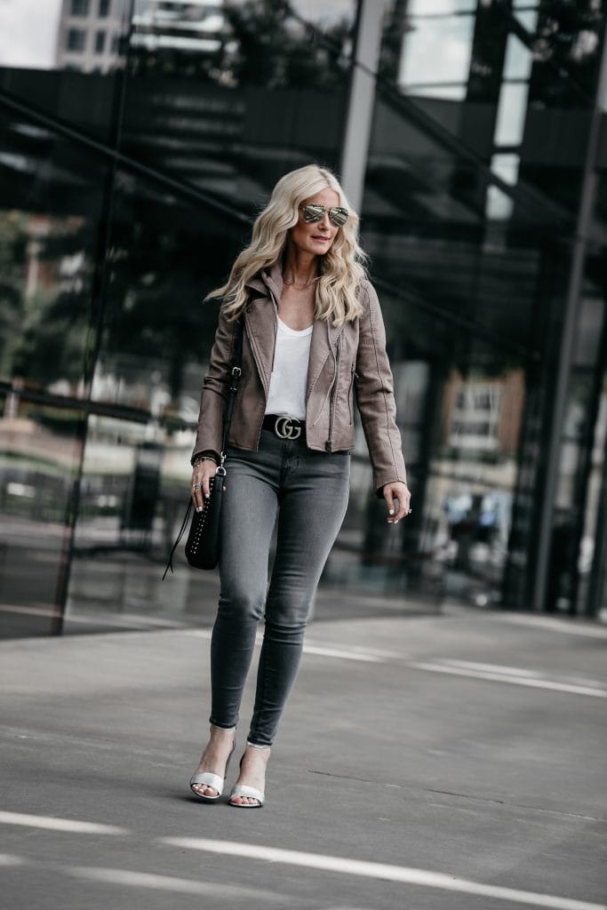 Dallas fashion blogger wearing gray skinny jeans and moto jacket 