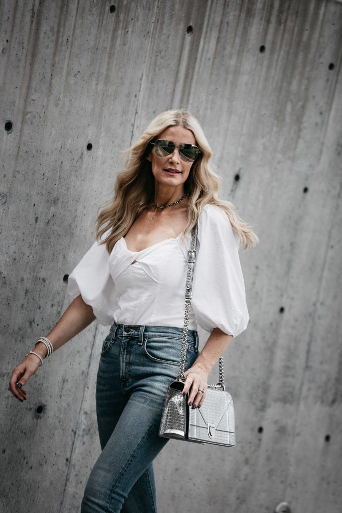 Dallas Style Blog wearing white top and jeans 