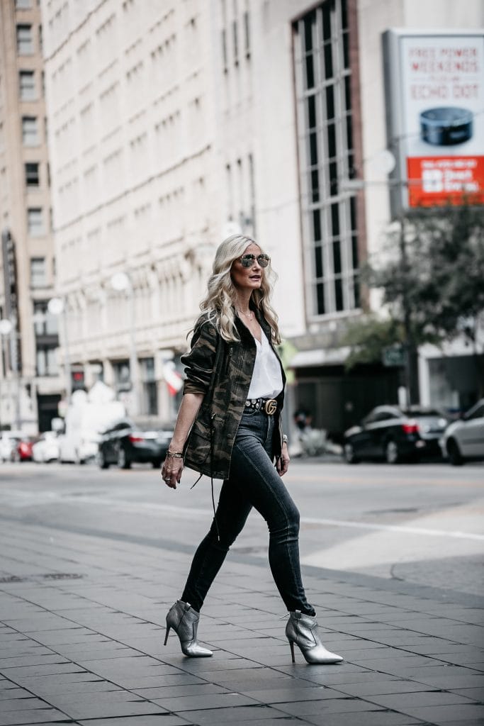Veronica Beard silver booties, Camo jacket, and gray jeans 