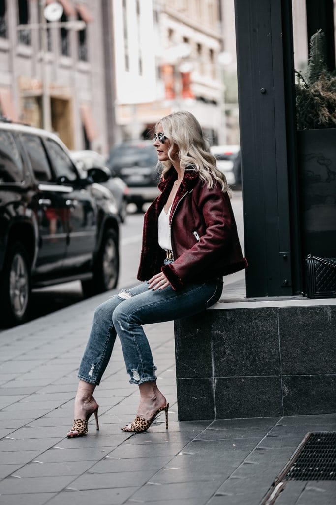 AOLA jeans, leopard heels, and faux shearling moto jacket 