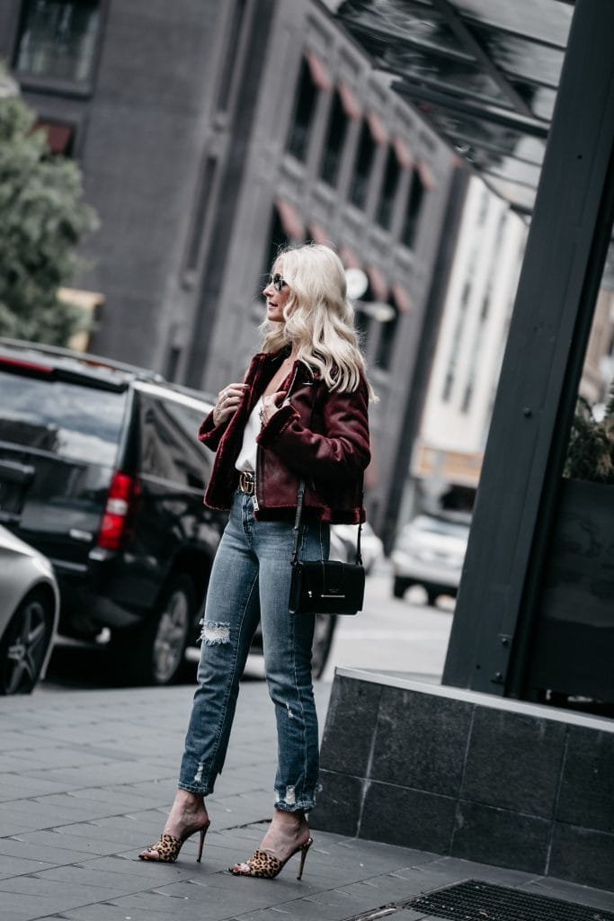 Dallas fashion blogger wearing leopard heels and shearling moto jacket 
