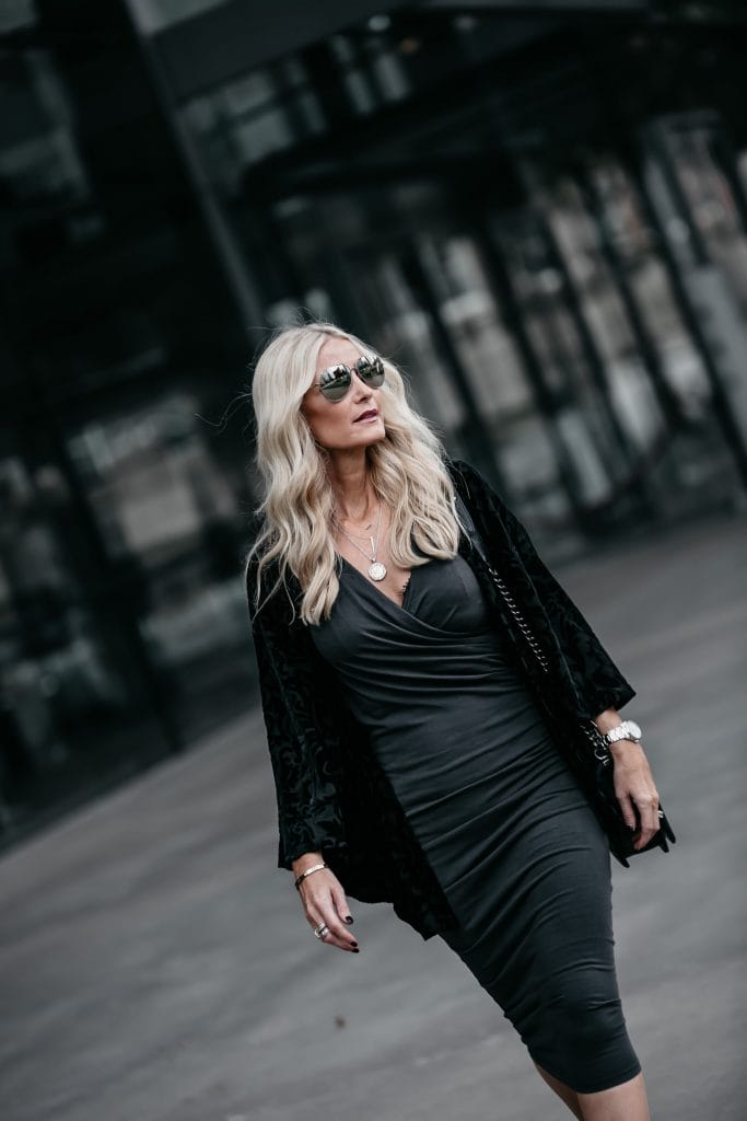 Dallas style blogger wearing gray midi dress