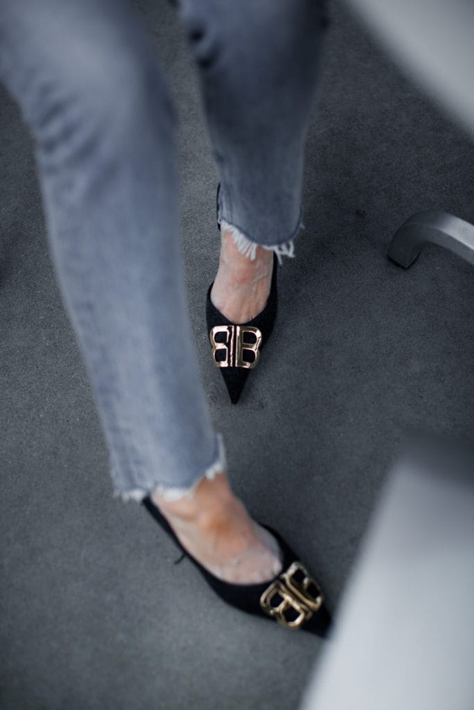 Dallas blogger wearing Balenciaga heels and Agolde jeans 