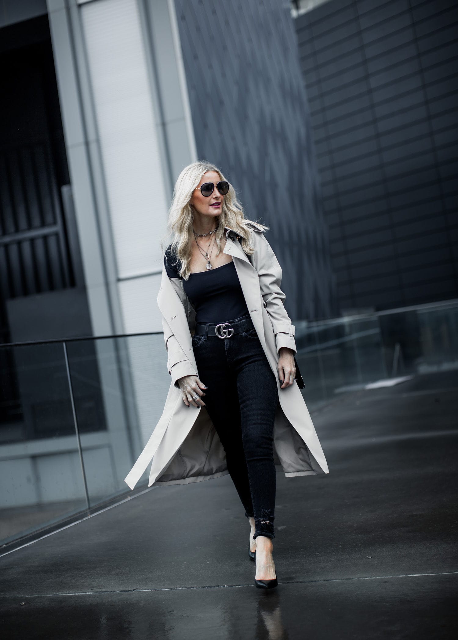 Dallas fashion blogger wearing chic trench coat and black skinny jeans 