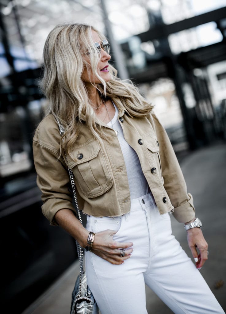 Dallas blogger wearing cropped jacket and Agolde white jeans 