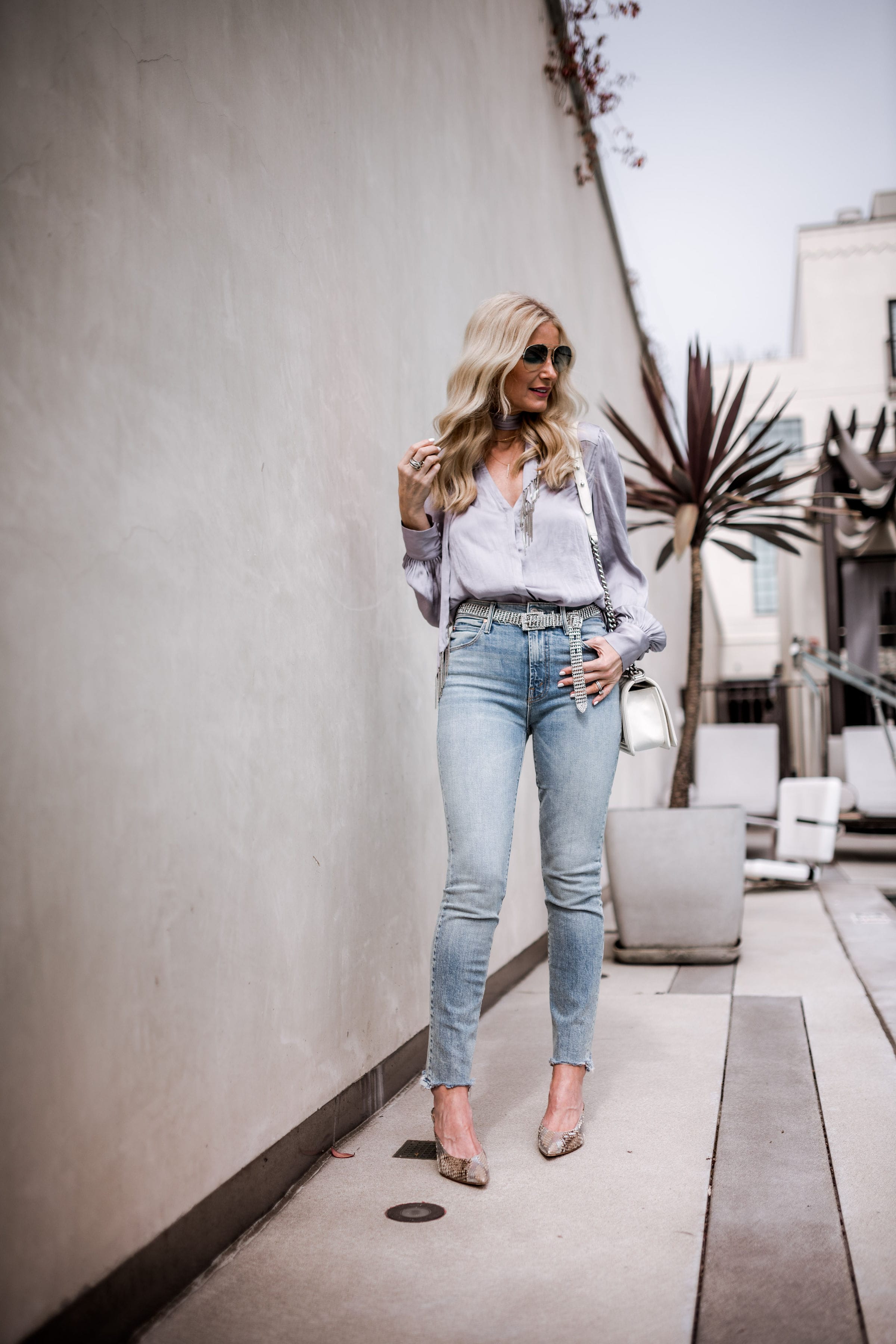 Dallas style blogger wearing Paige denim top and Mother jeans 