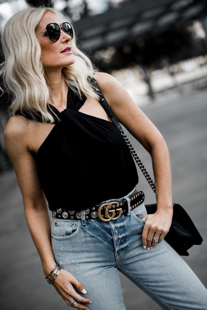 Dallas fashion blogger wearing a Gucci belt, black date night top and Mom jeans 
