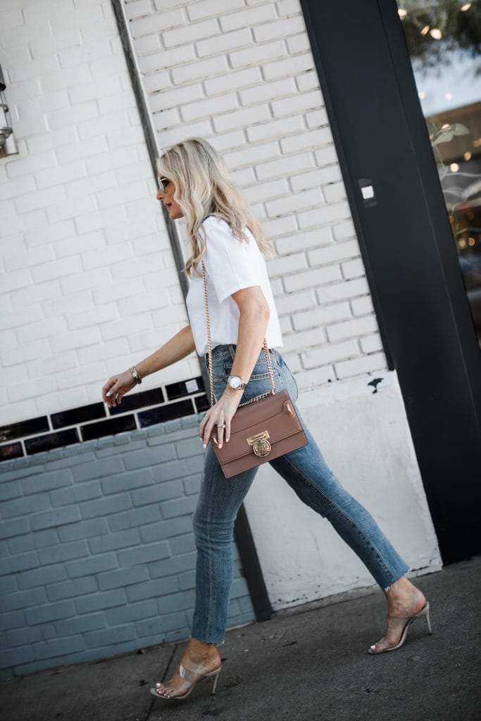 Dallas blogger wearing a white t-shirt and jeans