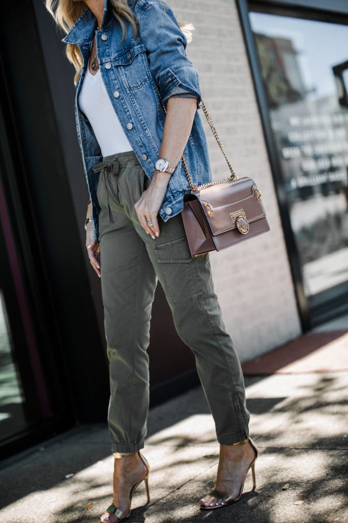 Dallas fashion blogger wearing a Madewell jean jacket and green army pants 