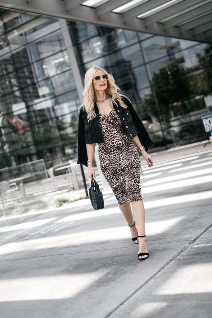 Dallas blogger wearing a leopard midi dress 