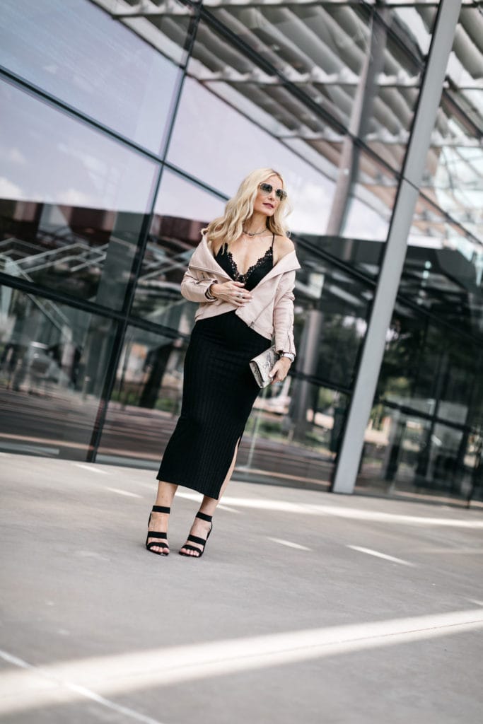 Dallas fashion blogger wearing a Topshop moto jacket and black midi skirt 