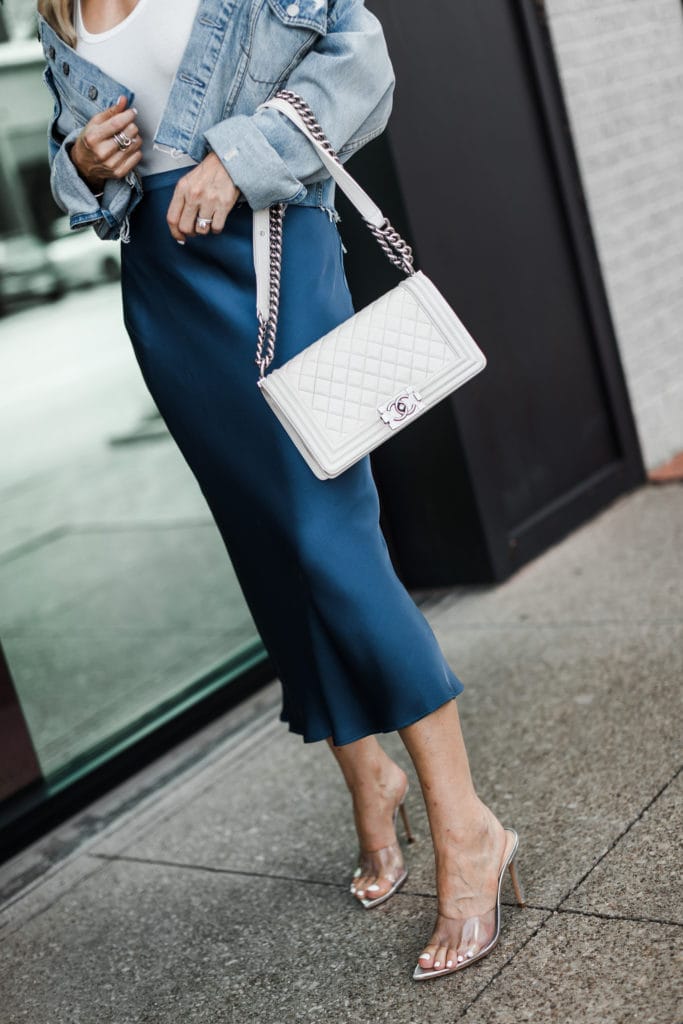 Blue Anine Bing midi skirt, Schutz heels, and a white Chanel Boy Bag