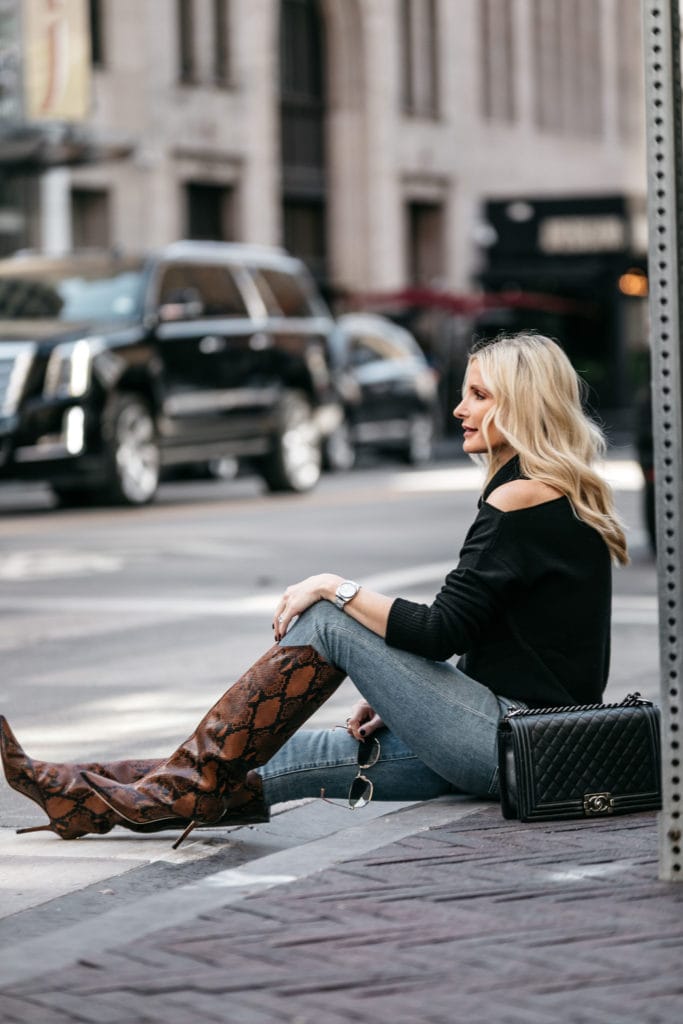 Dallas fashion blogger wearing denim and snake print boots
