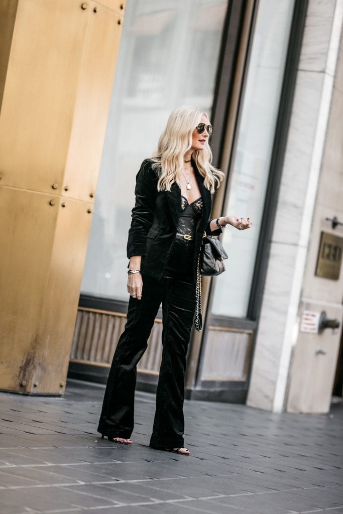 Dallas influencer wearing a black velvet suit