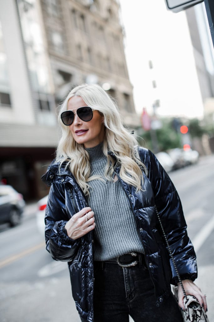 Blogger wearing Gucci sunglasses and a turtleneck sweater