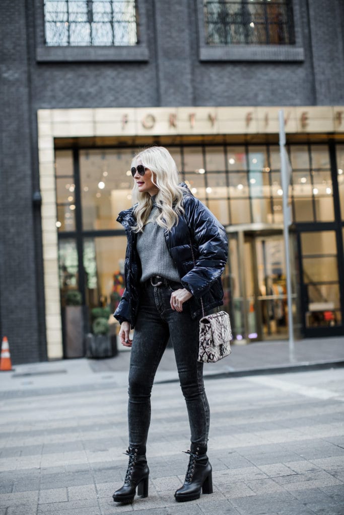 Dallas fashion blogger wearing a navy puffer jacket
