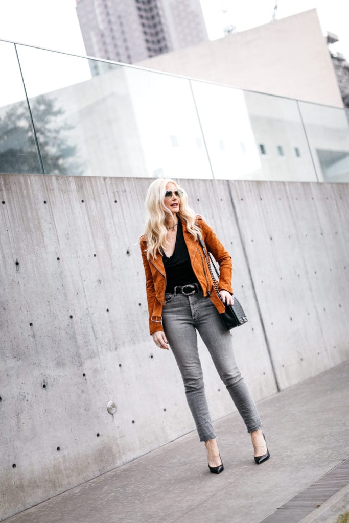 Dallas fashion blogger wearing a moto jacket and grey denim