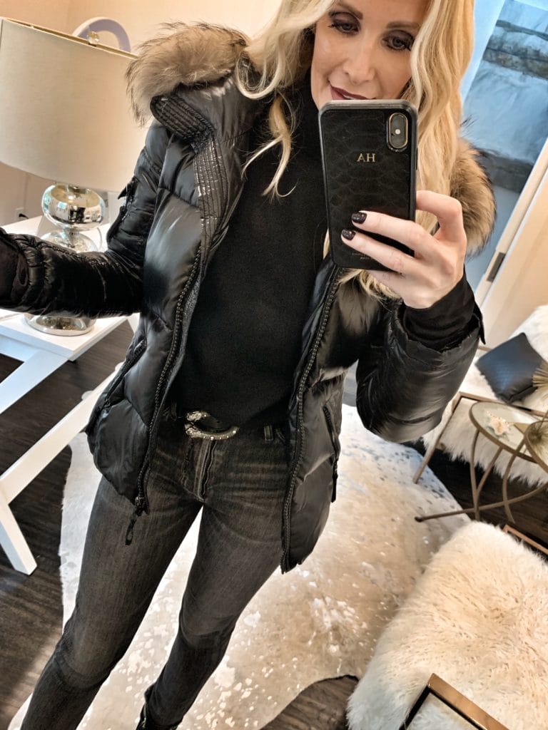 Fashion blogger wearing a faux leather puffer