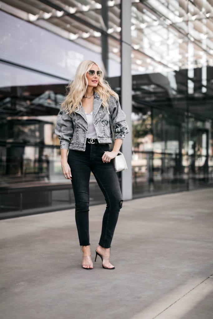 Dallas blogger wearing a denim jacket and heels