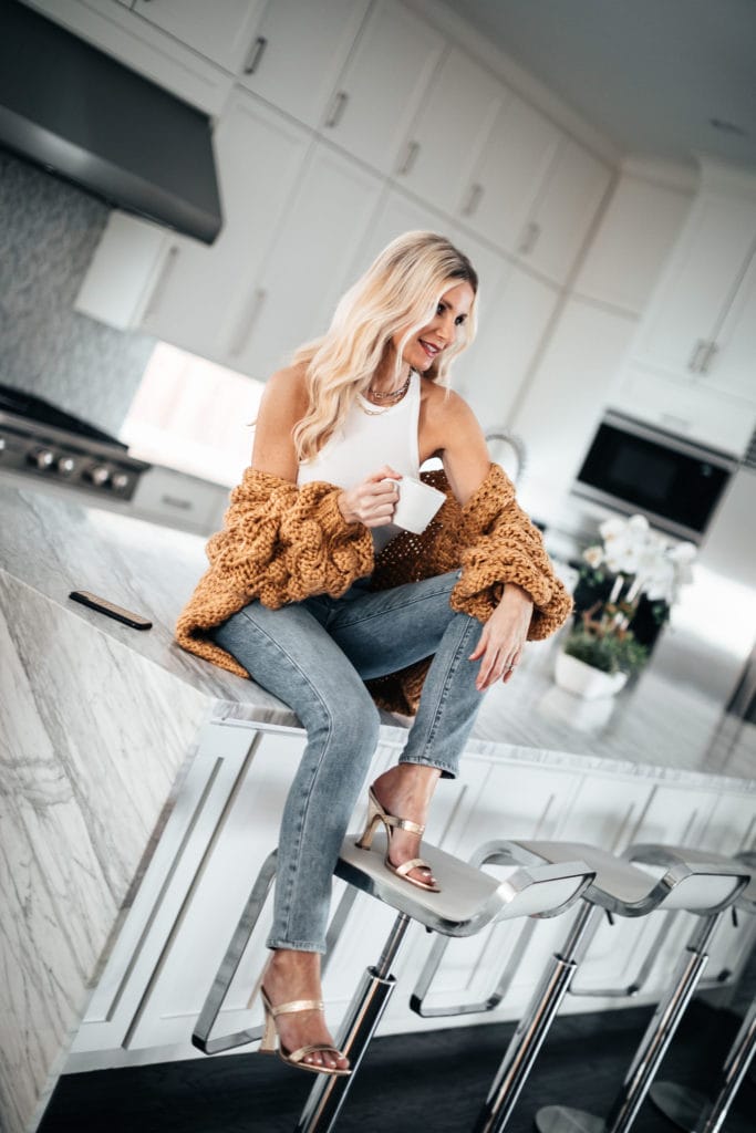 Dallas blogger wearing a mustard cardigan and gold heels