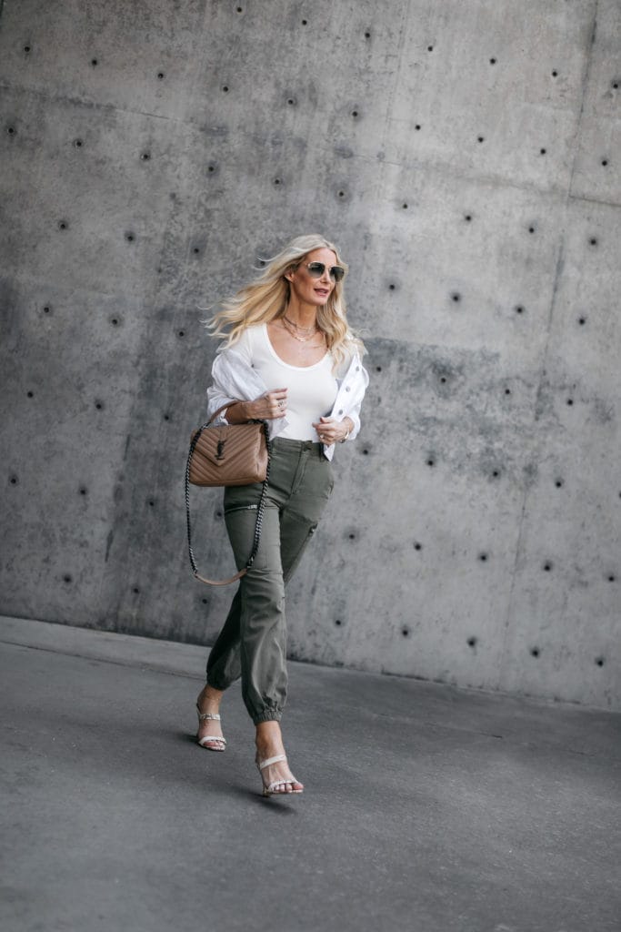 Dallas blogger wearing a white tank and green cargo joggers