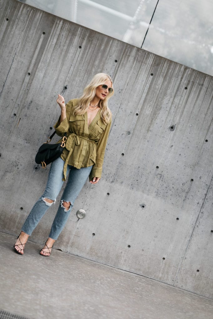 Dallas blogger wearing an olive green top