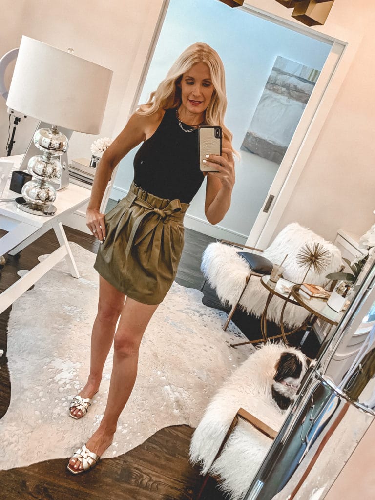 Dallas influencer wearing a leather skirt by Frame Denim