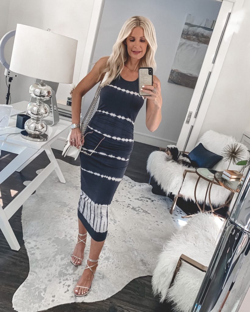 Dallas style blogger wearing a tie dye midi dress with summer heels