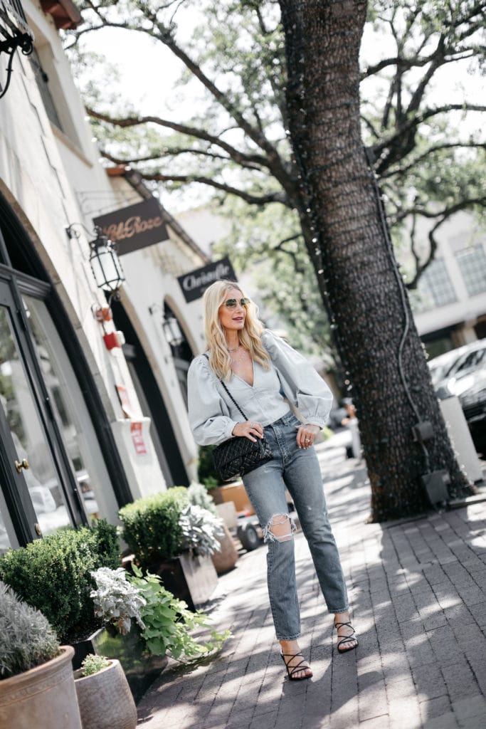 Dallas fashion blogger wearing a denim top and ripped jeans