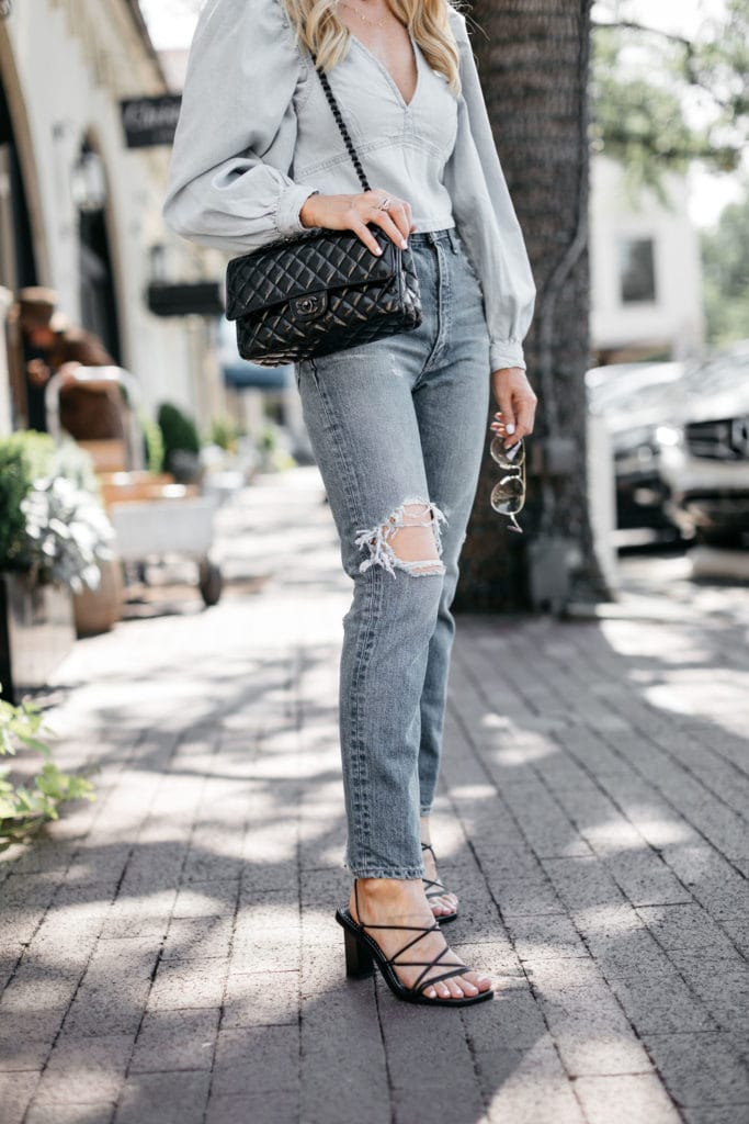 Dallas blogger wearing black strappy heels and vintage denim