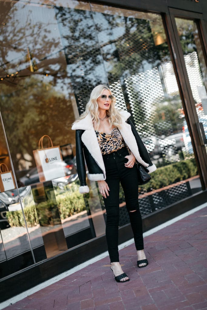 Dallas blogger wearing a cheetah cami and black shearling jacket from Nordstrom 