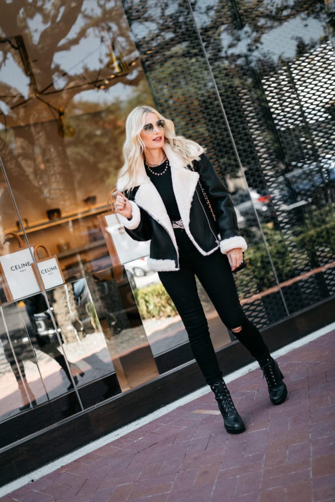 Dallas blogger wearing a shearling jacket and black combat boots from Nordstrom 