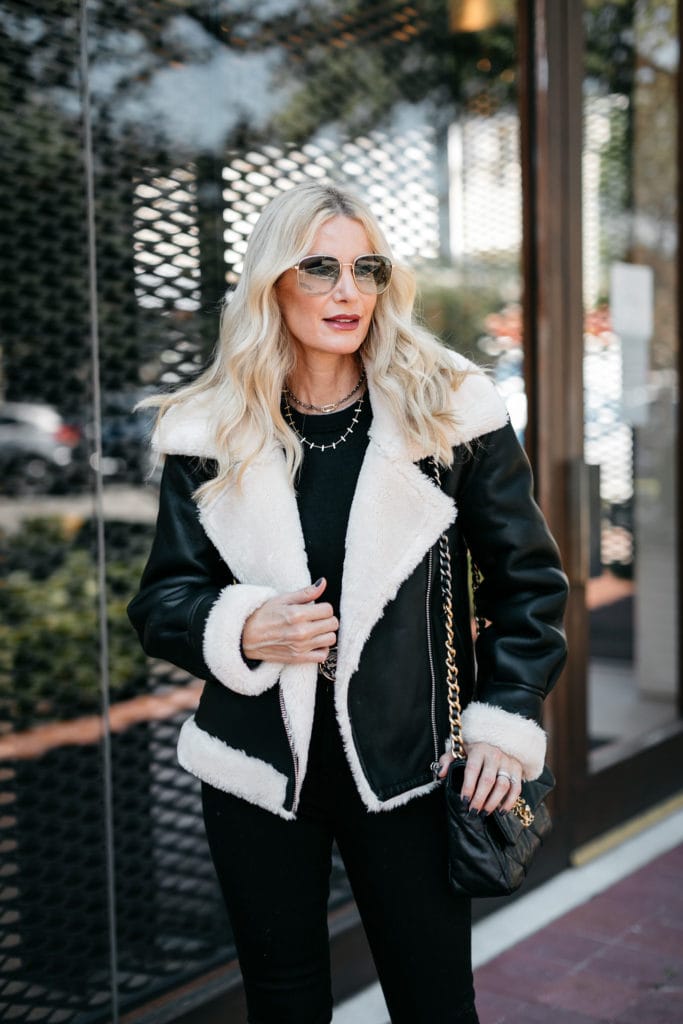 Dallas blogger wearing a shearling jacket from Nordstrom with black denim