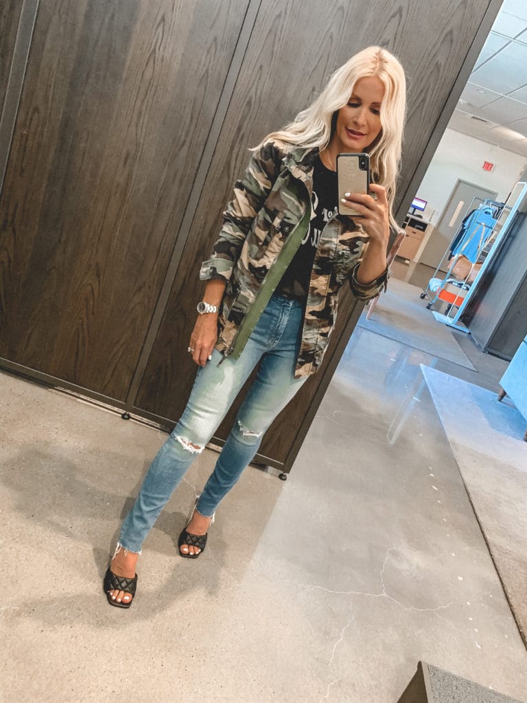 Dallas blogger wearing a camo utility jacket and light wash denim 