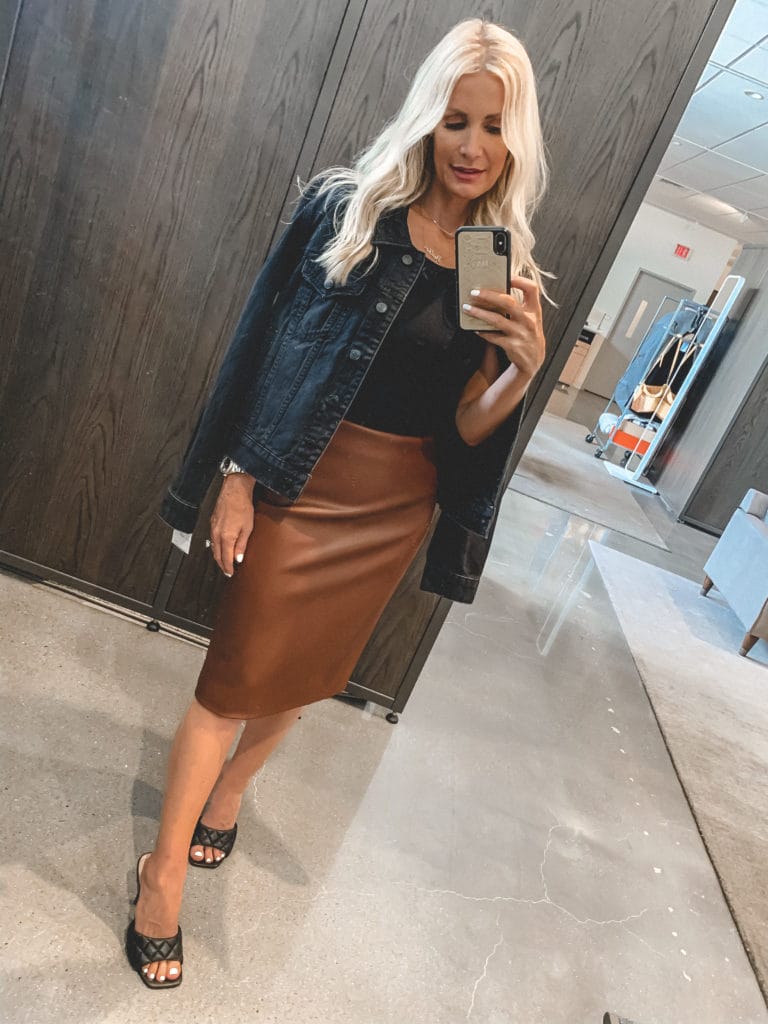 Dallas blogger wearing a brown leather midi skirt