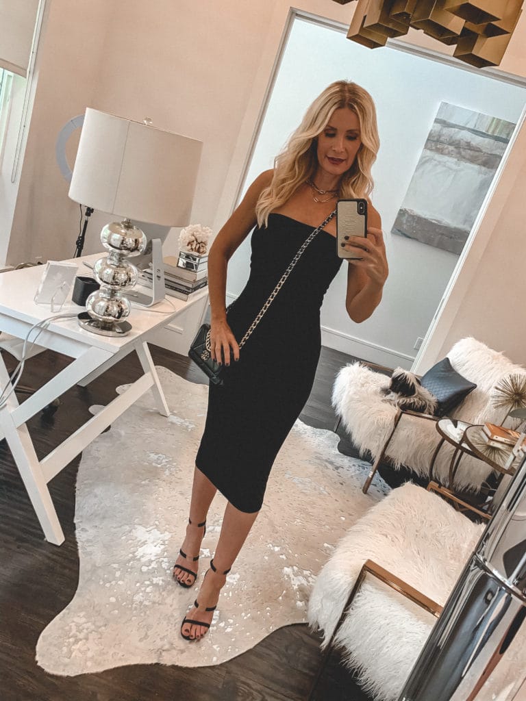 Dallas fashion blogger wearing a strapless little black dress and black heels
