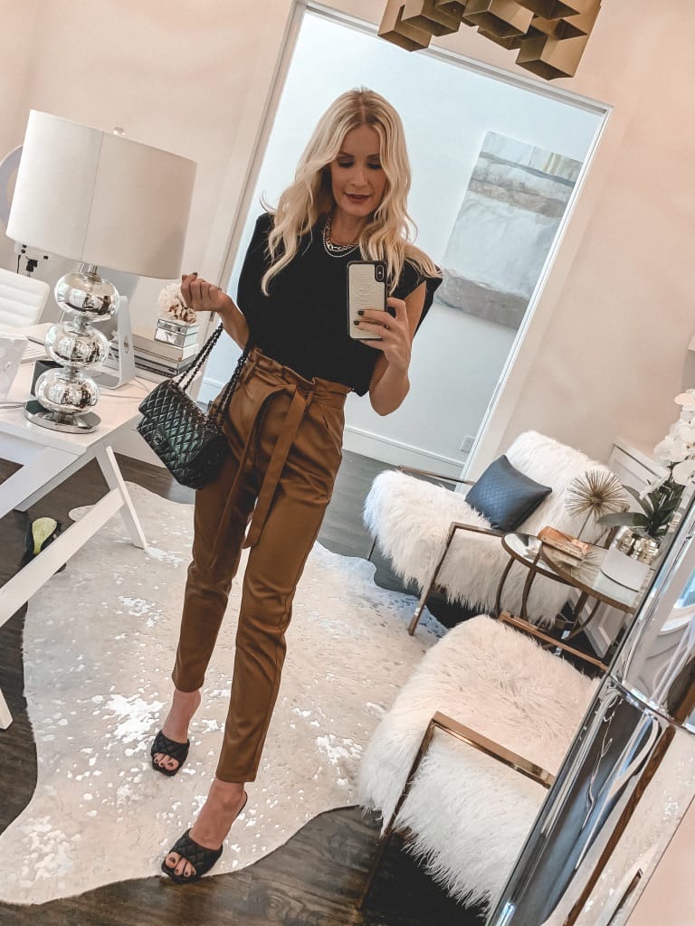 Dallas blogger wearing brown faux leather pants and a black muscle tank