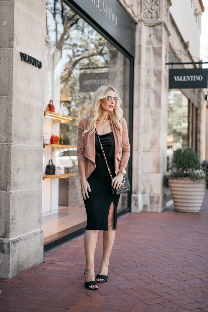 Dallas blogger wearing a suede jacket and a black slip dress