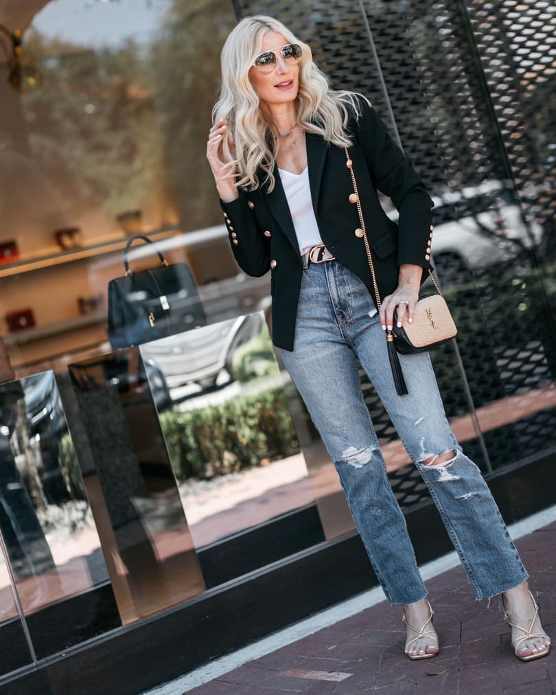 Dallas fashion blogger wearing a black blazer and ripped denim