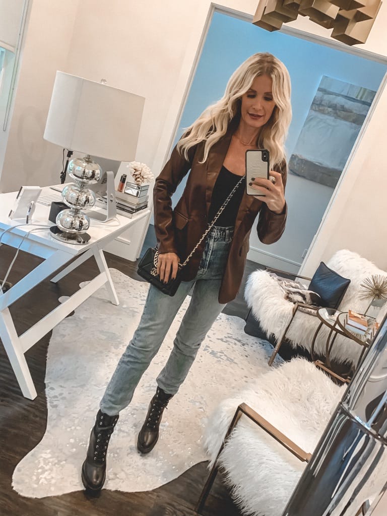 Dallas blogger wearing a brown leather blazer and denim with combat boots