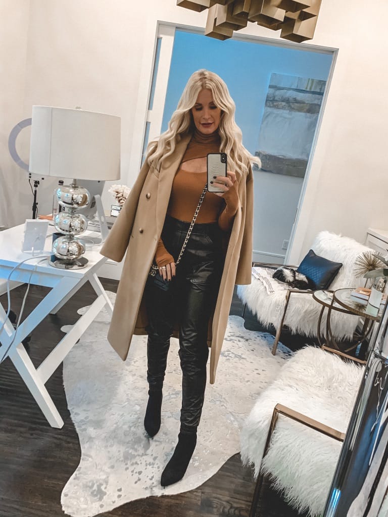 Dallas fashion blogger wearing a cut-out turtleneck and faux leather joggers for fall