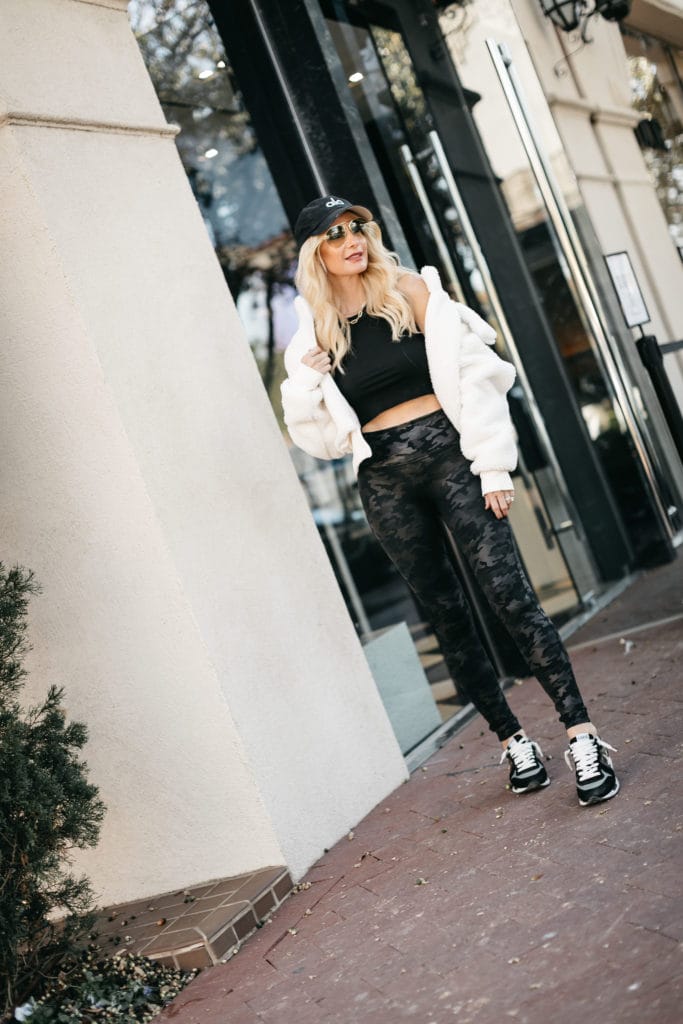 Dallas style blogger wearing Camo leggings by Spanx and Golden Goose sneakers 