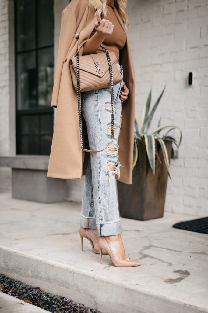 Dallas blogger wearing a neutral YSL bag and light wash ripped denim