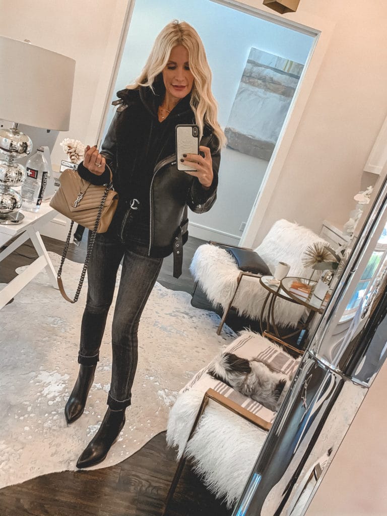 Dallas fashion blogger wearing a black coat and black denim