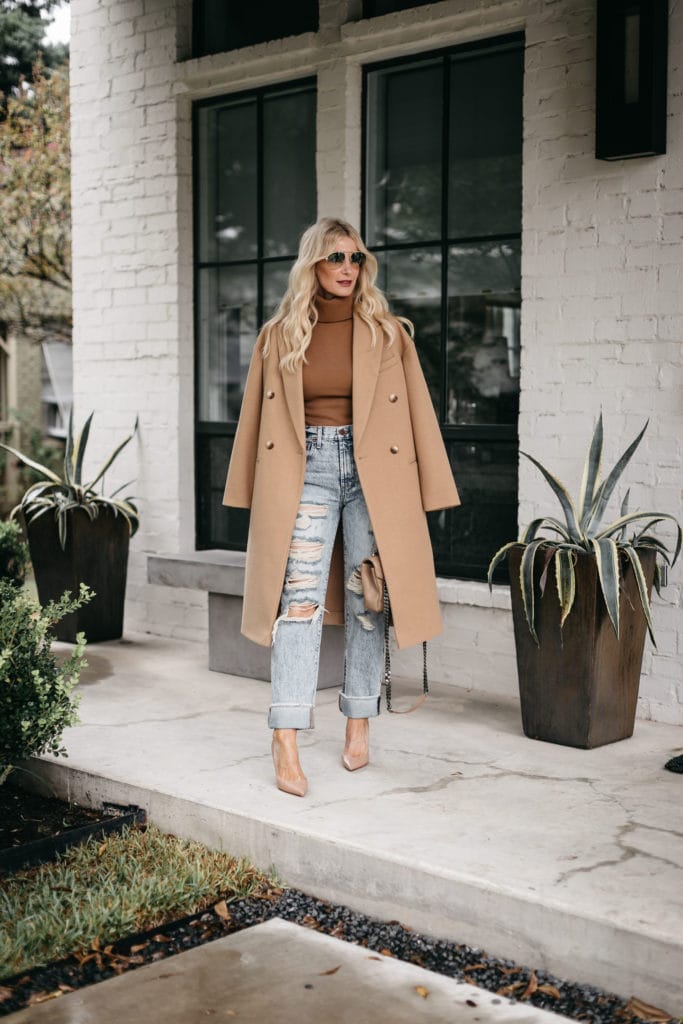 Dallas fashion blogger wearing light wash ripped jeans and nude heels