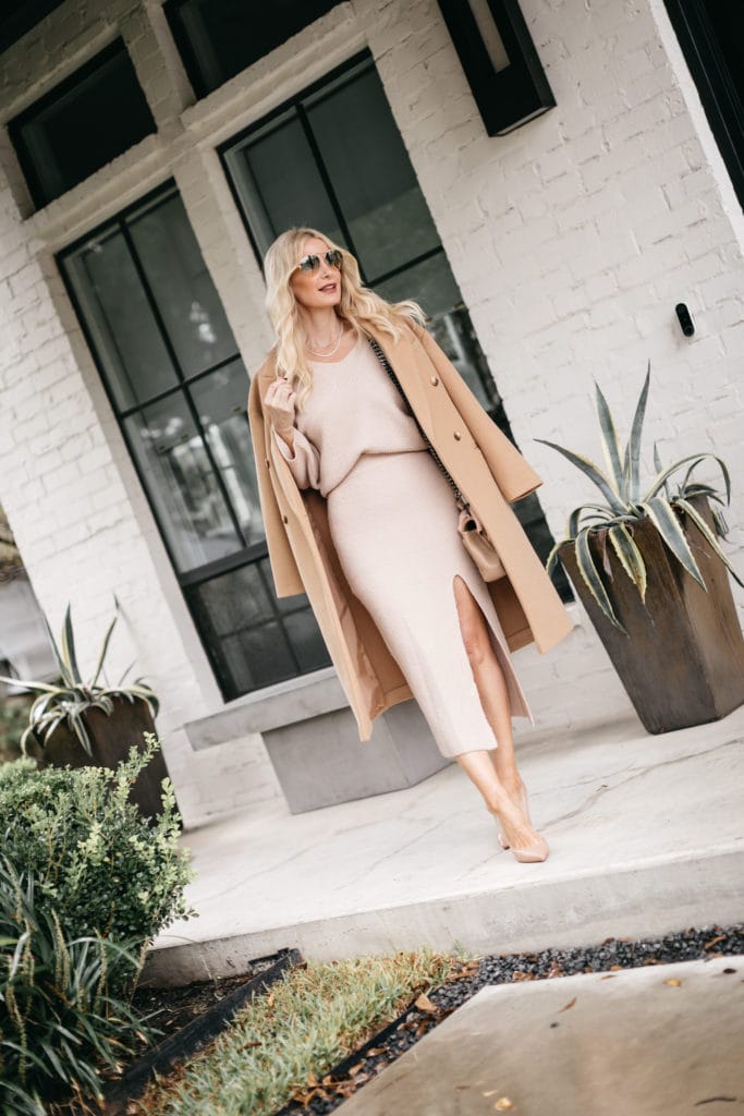 Dallas blogger wearing a camel colored coat and a neutral skirt