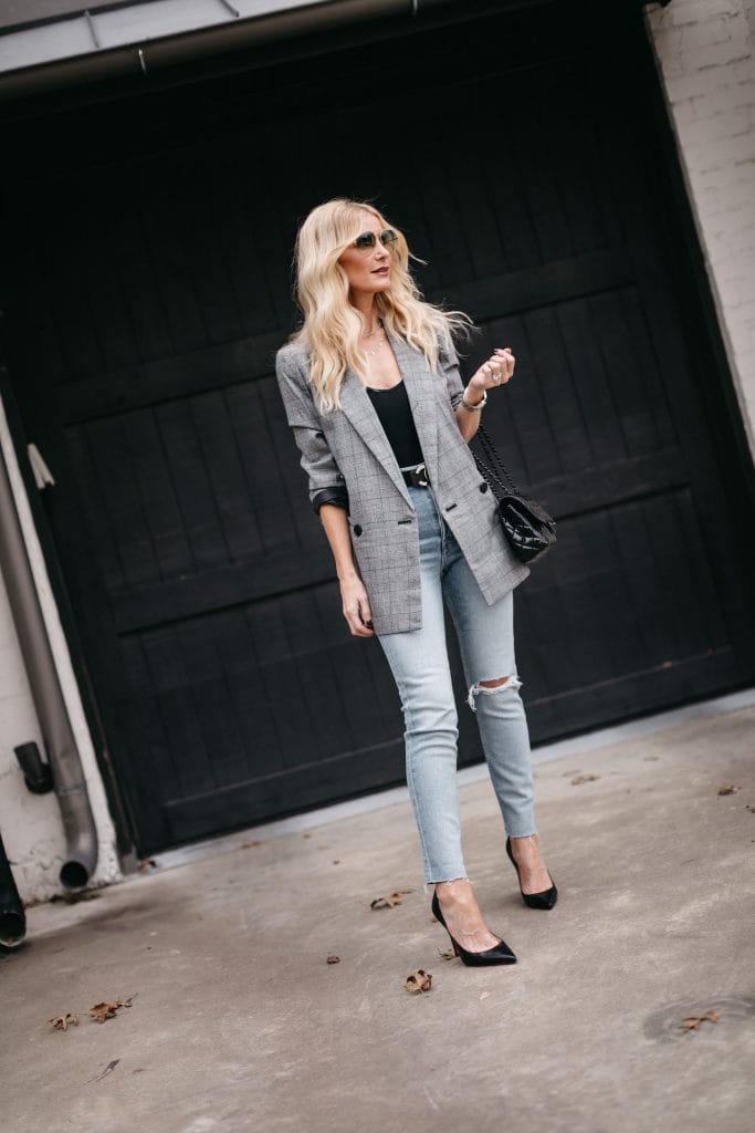 Dallas blogger wearing Redone light wash denim and a grey blazer