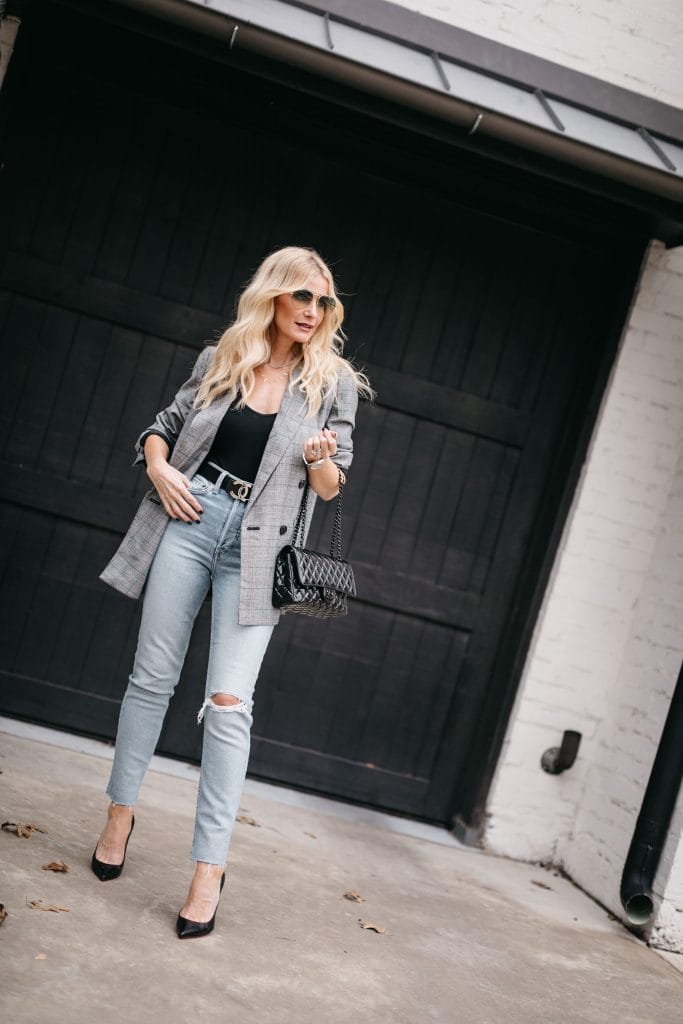Style blogger wearing a grey blazer and light wash denim | wardrobe basic checklist