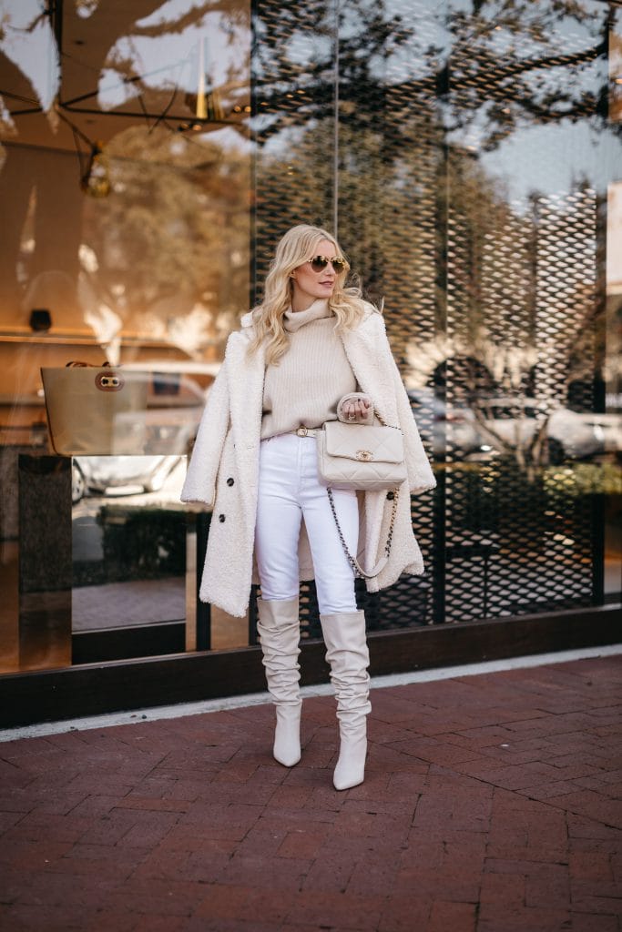 Dallas style blogger wearing white denim and a white teddy coat