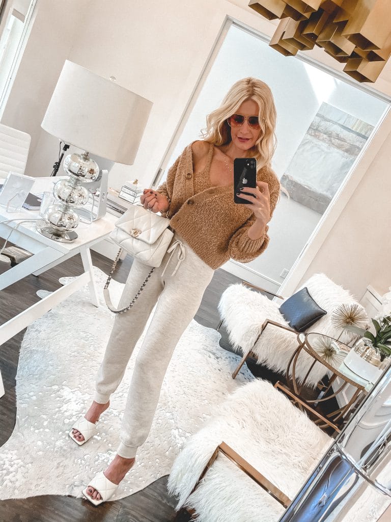 Dallas blogger wearing a cardigan set and cozy joggers with heels